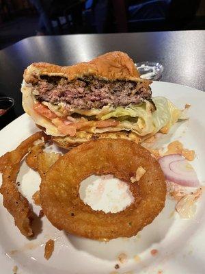 Ivy mill burger cooked medium w/ onion rings