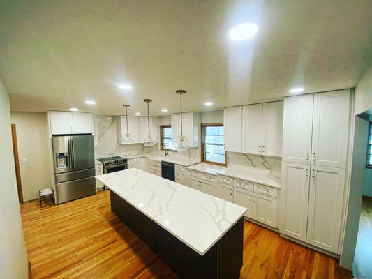 kitchen remodel in Lincoln, Nebraska. pendant lights, recessed lights, GFCI receptacles, switching, wire garbage disposal & dishwasher