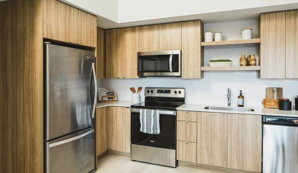 Your kitchen has ample cabinet space and wood floors