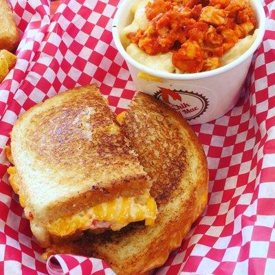 The Grilled Pimento cheese sandwich and buffalo chicken topped Mac and cheese