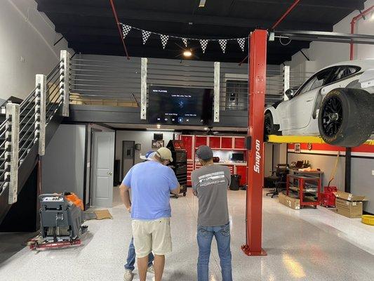 A true Man cave. This is not a mechanic shop for anyone but his toys! TV and Speaker install is what we did here.