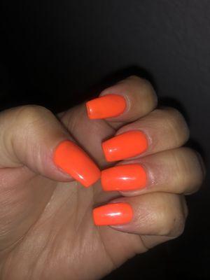 Orange gel on coffin nails