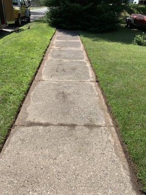 Freshly edged sidewalk.