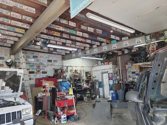 Clean shop, license plates from all over the country,  and then some.