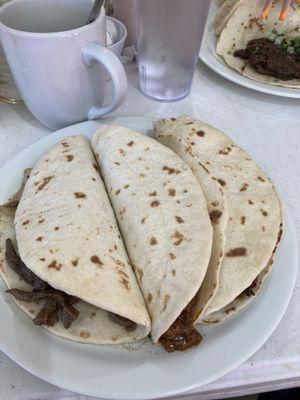 My 2 guisada tacos and asada taco