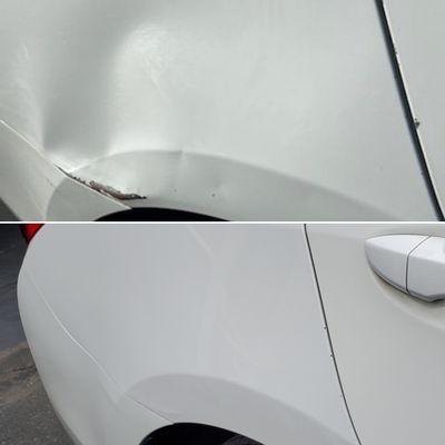 Paintless dent repair on a Toyota Corolla quarter panel with paint touch up.