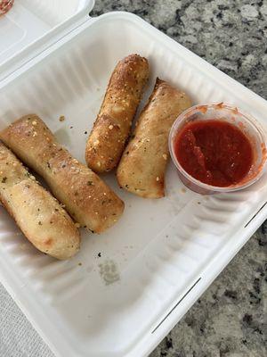 Single order of Breadsticks W/pizza Sauce (comes with 5)