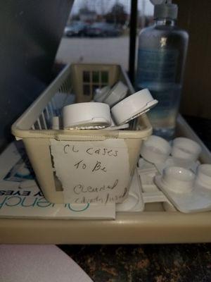 Contact lens cases to be cleaned. Only using cold water and hsnd soap. Not sterile, very unsanitary. GROSS.