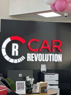 Inside the dealership sign