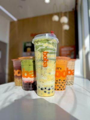 [L to R] Galaxy Iced Tea w/Mango Stars, Strawberry Matcha w/Boba, Matcha Brûlée w/Boba, Thai Tea w/Boba, Brown Sugar Milk Tea w/Boba