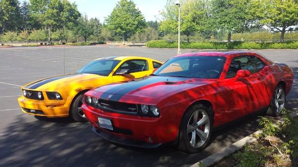 My Challenger all fixed up and next to a fellow sports car