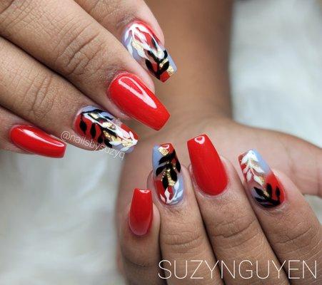 Acrylic set w/red gel polish and leaves art.