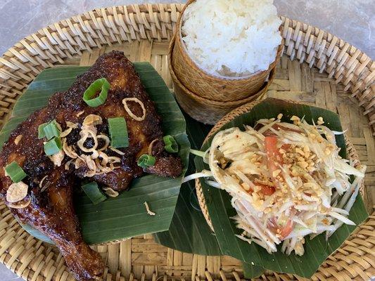 Kook kai chicken, sticky rice, and papaya salad