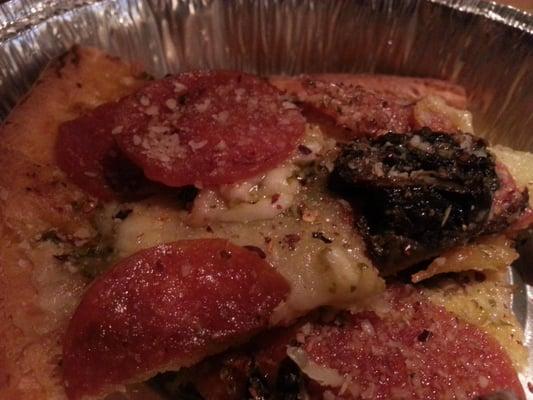 This is mushroom, pepperoni, red sauce/pesto mix