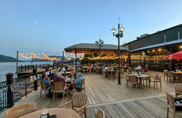 The large patio with mountain and river views