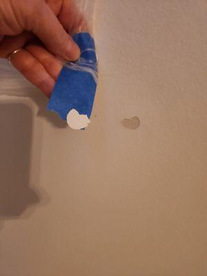 Paint removed by tape