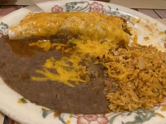 Shredded beef burrito with refried beans and rice