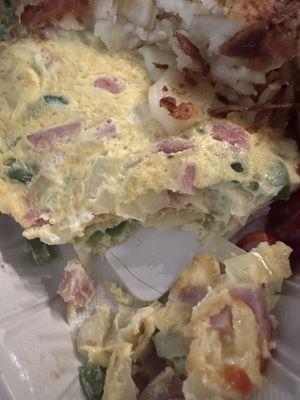 Black hair inside the omlette