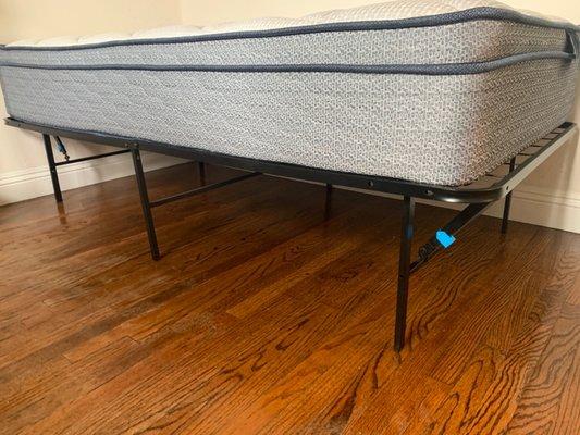 Folding bed frame that can be stored when you don't have a guest.