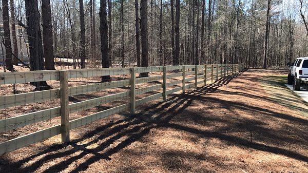 4' 4-Rail corral board fence with wire backing