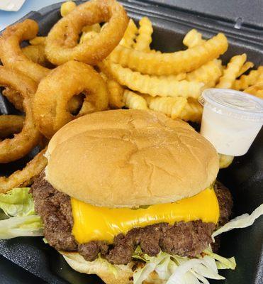 Single cheeseburger with fries and beer battered onion rings