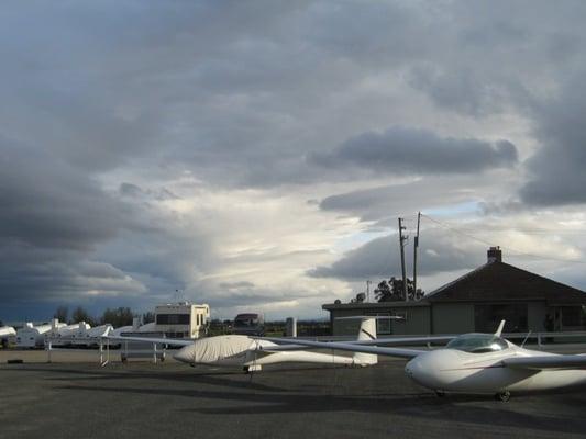 View of the flight line in March 15, 2009.  Wave clouds in the background