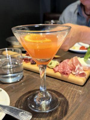 Blood orange martini and antipasti board.