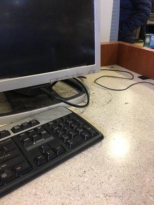 Seriously how hard is it to clean the public computer they have? This is gross.