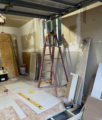 During a garage to bedroom conversion demolition and remodel