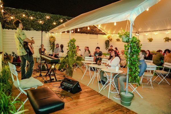 The Santa Monica Songwriter's Open Mic every Tuesday in the Kavahana Santa Monica patio