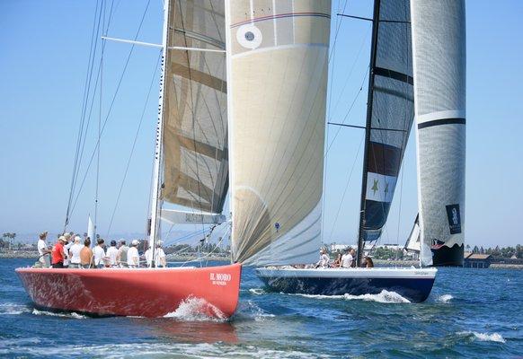 America's Cup racing yachts on San Diego Bay.  IL Moro ITA-16 edges ahead of Stars & Stripes.