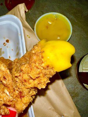 Boneless Chicken Finger dipped in Honey Mustard