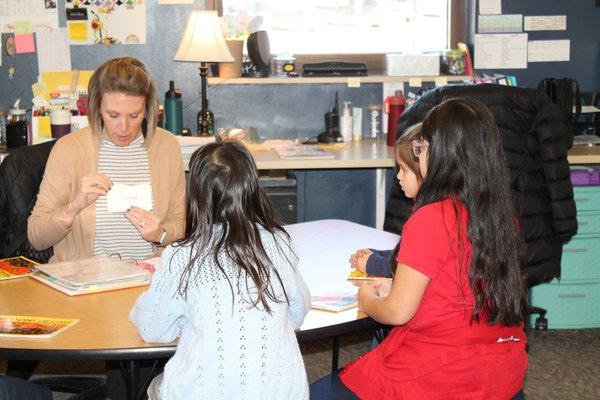 Students learning flashcards in the classroom