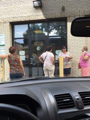 Anytime that I have gone there the line is always coming out the door. only two clerks One of the clerks was posting on FB while working