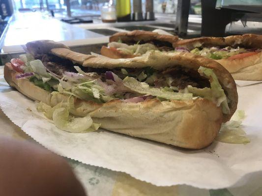 Two of our delicious Footlong Steak & Cheese