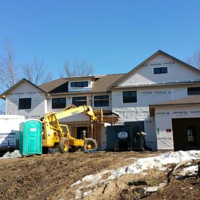 finishing up electrical rough-in on second floor at new home in Forest Hills with Viersen Construction