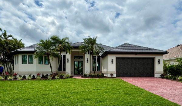 A Slate colored garage door gives your home a new modern look.