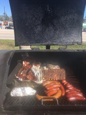 Delicious sausage, ribs, boudin, and moist brisket