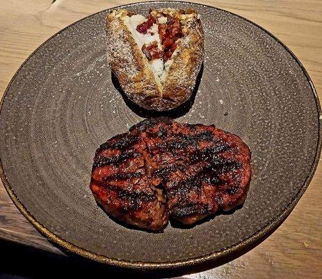 On previous visit - rib eye and baked potato!  Cooked perfect!