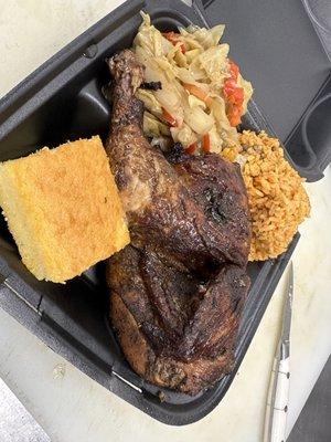 Jerk Chicken dinner with Caribbean cabbage, arroz con guandules, & sweet cornbread