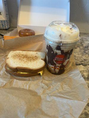 Steak egg and cheese sandwich on Texas toast with a mocha iced cappuccino