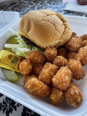 Cheeseburger and tots. Very good, great bun.