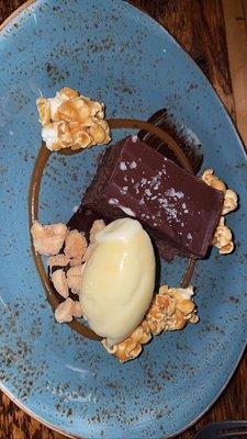 Chocolate cake with sweet corn ice cream and homemade caramel popcorn