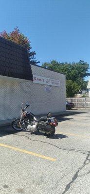 Side view of the restaurant, front was tough to get due to sunny day.   It's across the street from the Cumberland Farms.