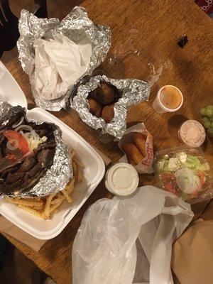 Gyro dinner with salad, mozzarella sticks and fried Oreos