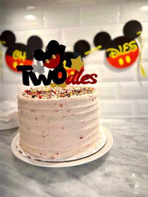 3-layer round strawberry cake. So delicious!!! (I added Mickey sprinkles and cake topper.)