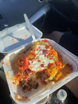 B.Y.O.P (I built my own potato with sour cream, green onions, hot Cheetos, bacon, and sour cream!