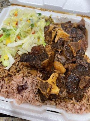 Large oxtails, cabbage, rice and peas