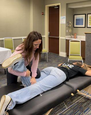 Dr. Vleko performing a knee adjustment.