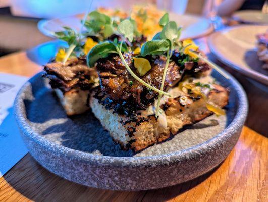 Mushroom Toast. $14. Glazed maitake, shishito jam, Parmesan cream, grilled focaccia. My favorite dish here.